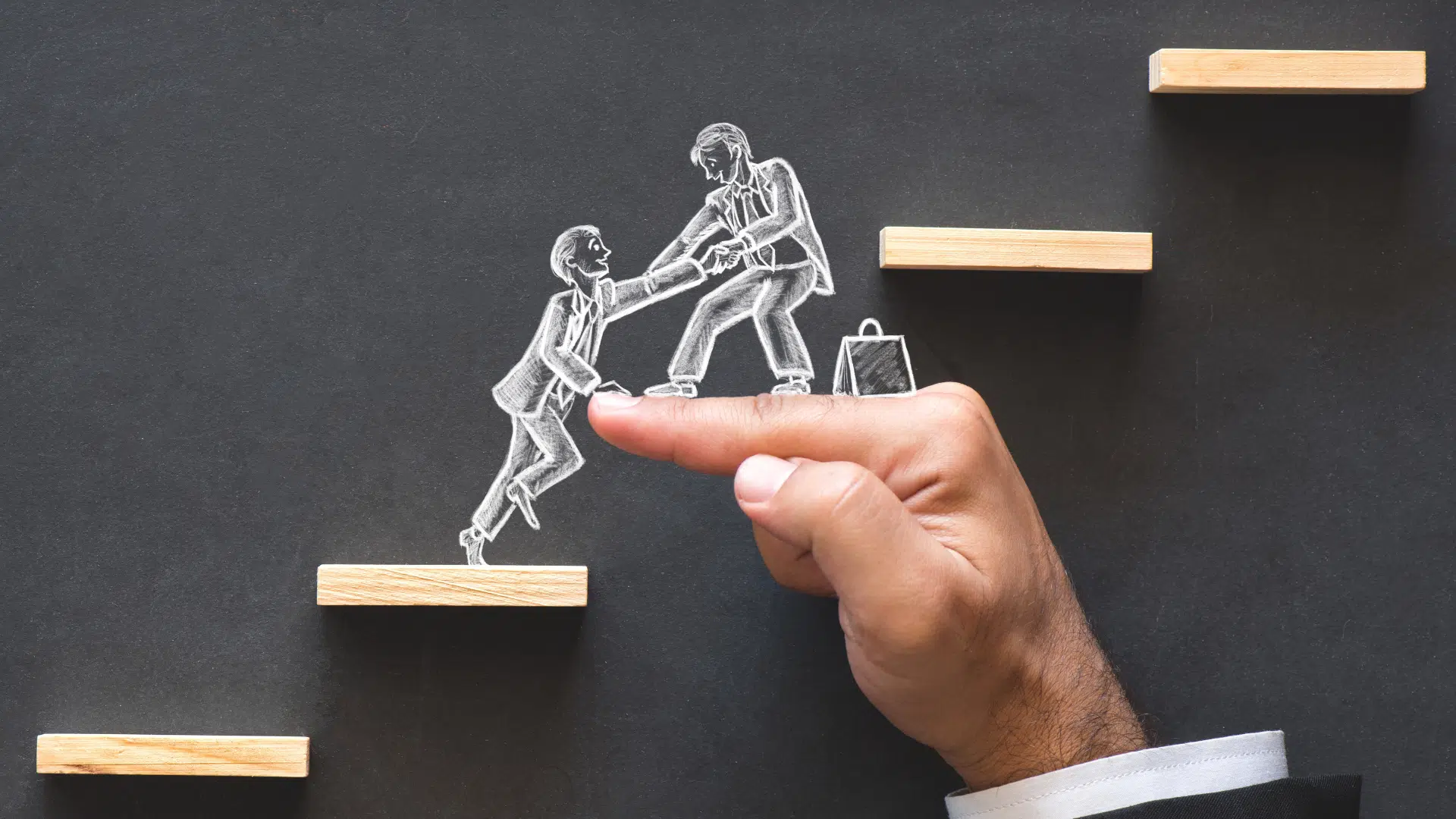 Drawing of one person helping another climb between steps.